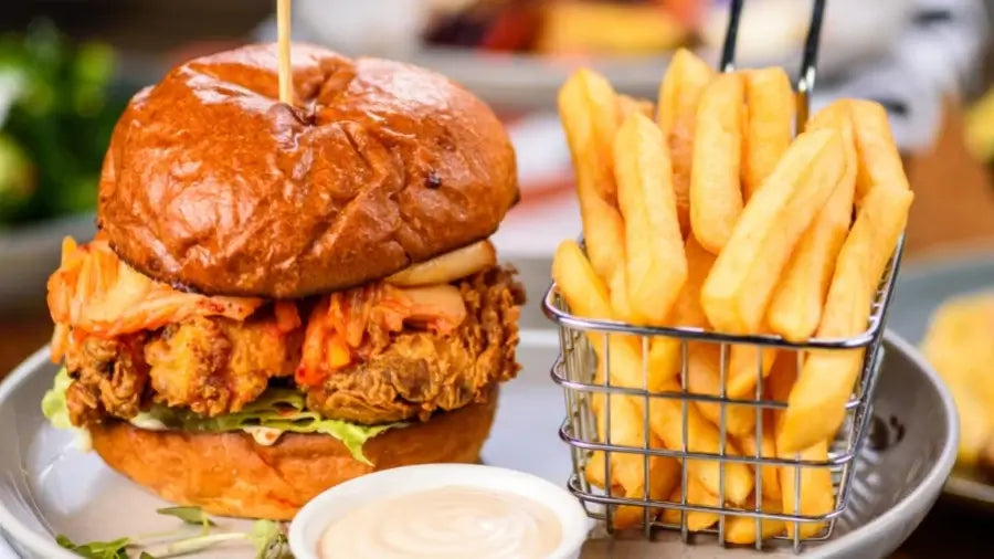 Crispy chicken fillet burger with fries 