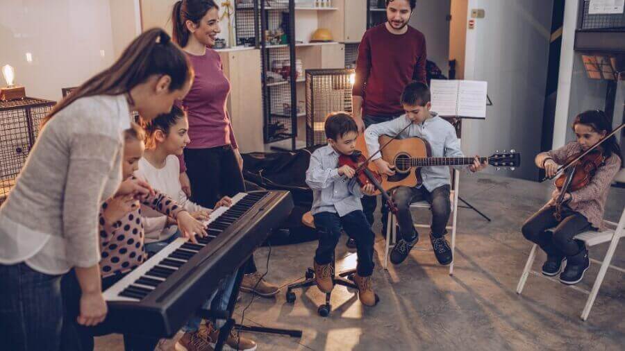 kids playing with music instrumental instruments