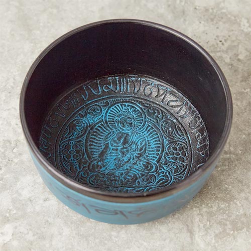 close up of blue buddha Khudi singing bowl