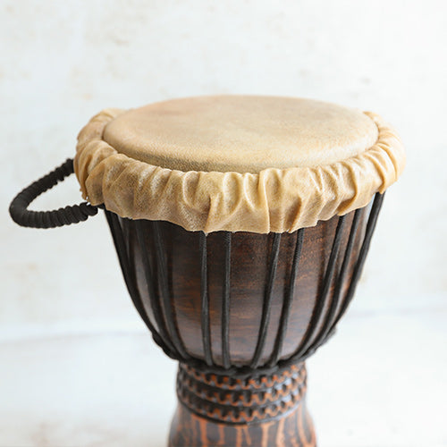 Close up of animal hide skin on djembe