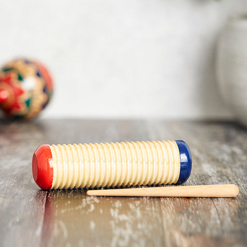 Red and blue morus guiro shaker with solid wood beater