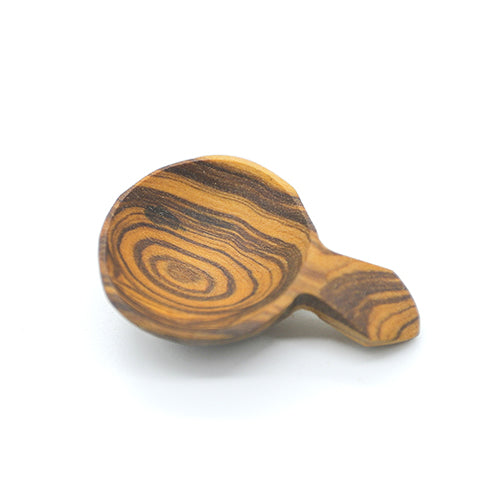 Top view of a large scoop-style Nyeri olive wood spice spoon