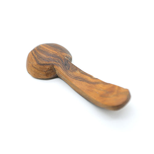 Bottom view of a small scoop-style Nyeri olive wood spice spoon