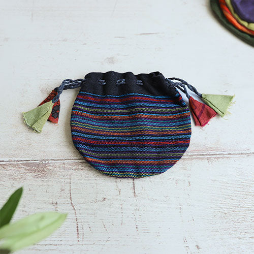 Red, blue, green, and orange striped cotton drawstring coin pouch