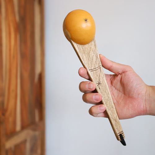 gourd fojo shaker in hand