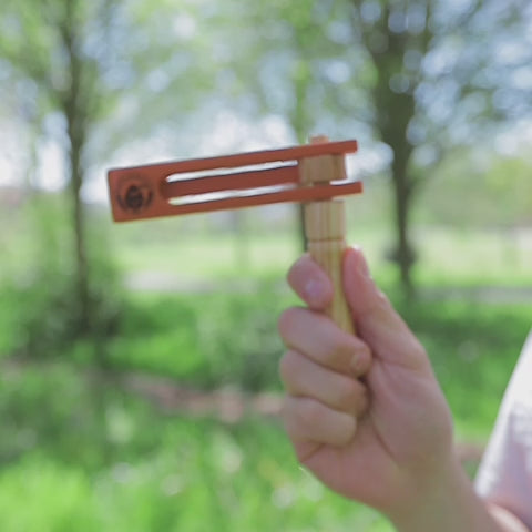 Wooden rattlesnake football rattle sound demonstration