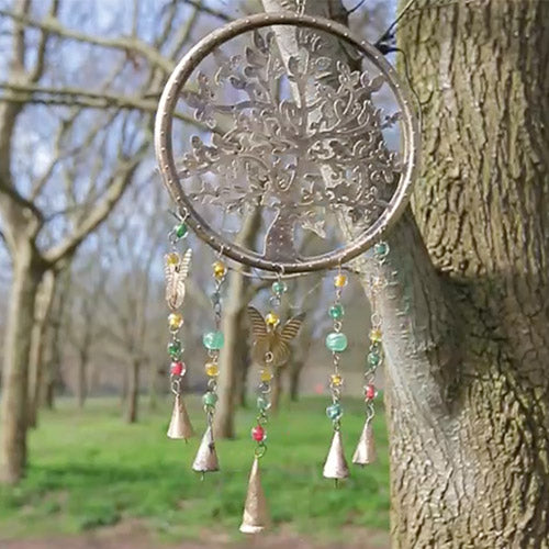 Indian Tree of Life windchime hanging on a tree in the park