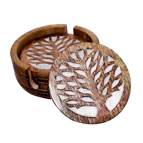 Close up of mango wood tree of life design coasters