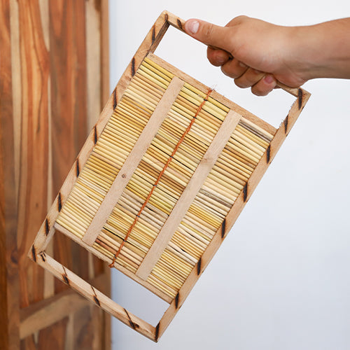 african washboard shaker in hand